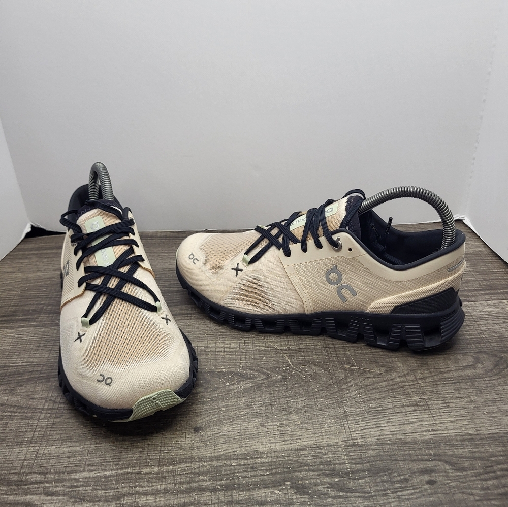 On Running Athletic Shoes in Beige and Black